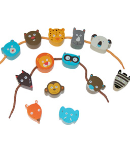 Illustratrice, pour Oxybul-Eveil et Jeux
14 perles animaux en bois.